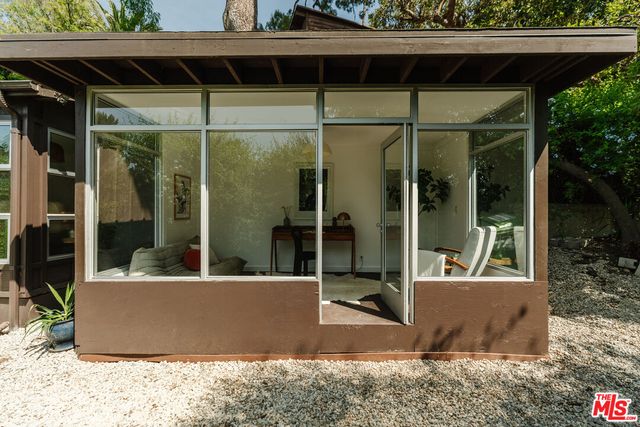 a room with furniture and a window