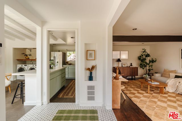 a view of a living room and dining room