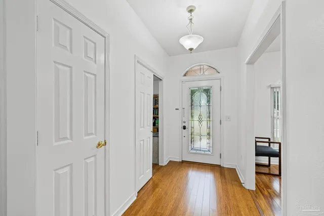 a view of entryway with wooden floor