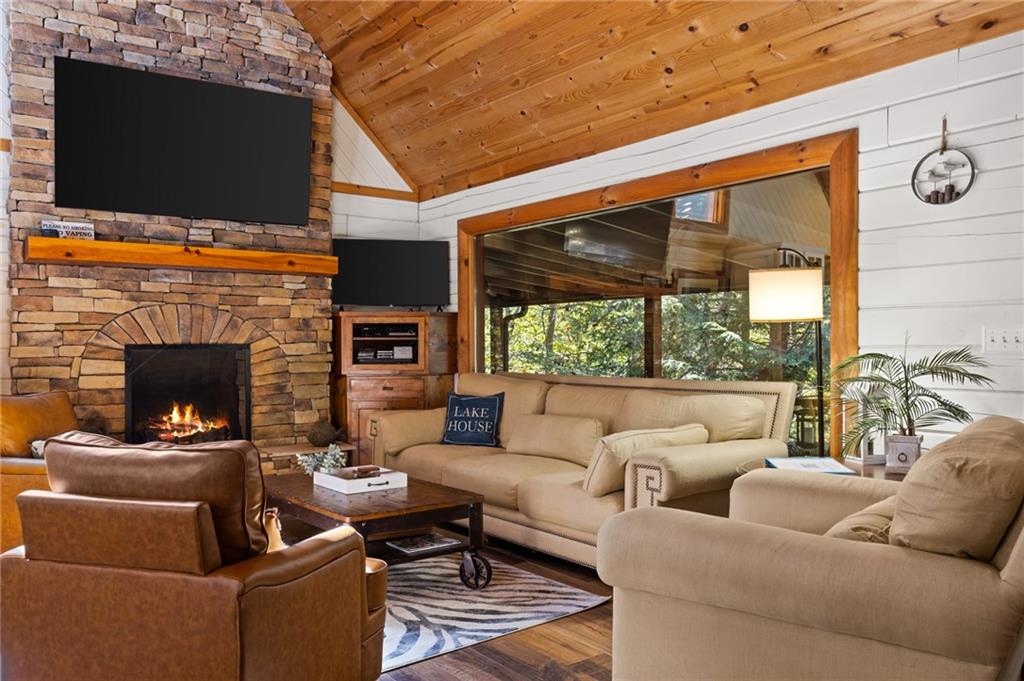 454 High Country Lane Morganton, GA 30560 - Photo 25 of 79 a living room with furniture a fireplace and a flat screen tv