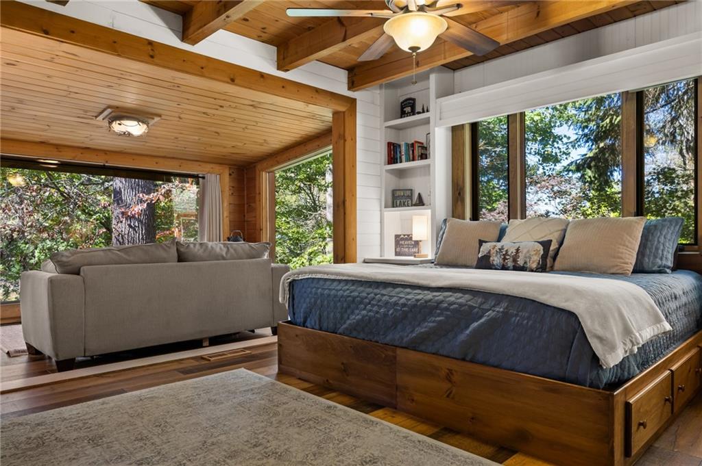 454 High Country Lane Morganton, GA 30560 - Photo 29 of 79 a bed sitting in a bedroom next to a window