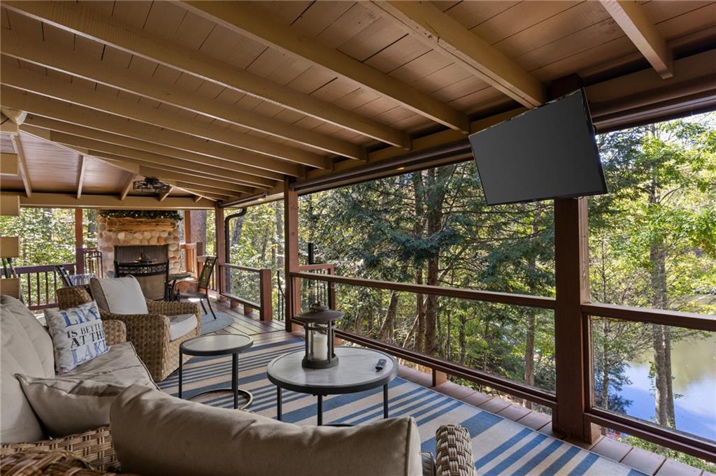 454 High Country Lane Morganton, GA 30560 - Photo 55 of 79 a living room with furniture and a floor to ceiling window