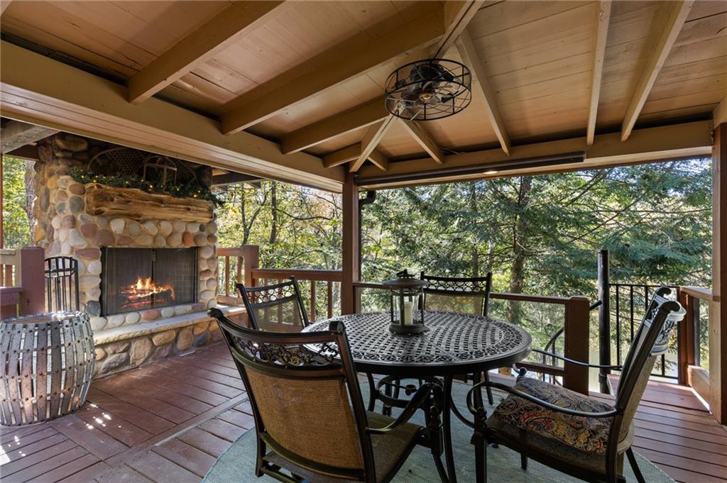 454 High Country Lane Morganton, GA 30560 - Photo 59 of 79 a view of a chairs and table in the patio