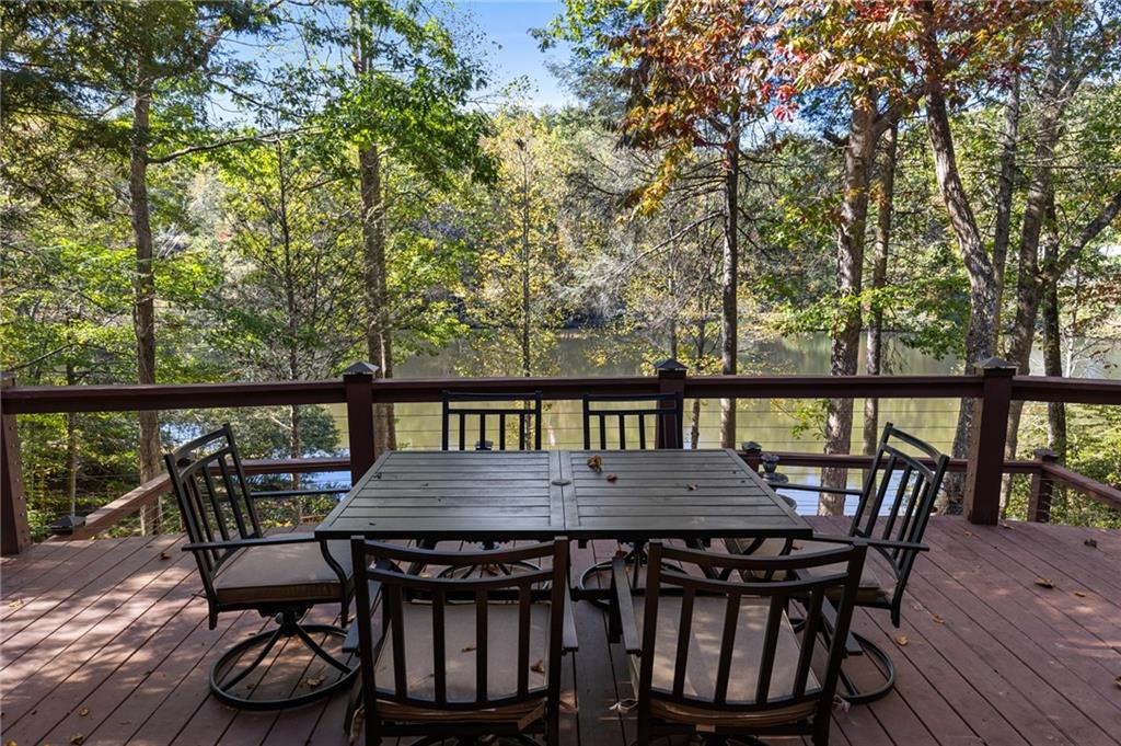 454 High Country Lane Morganton, GA 30560 - Photo 67 of 79 a view of a dining room with furniture and wooden floor