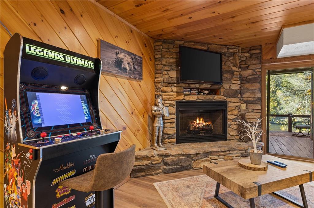 454 High Country Lane Morganton, GA 30560 - Photo 75 of 79 a living room with fireplace furniture and a flat screen tv