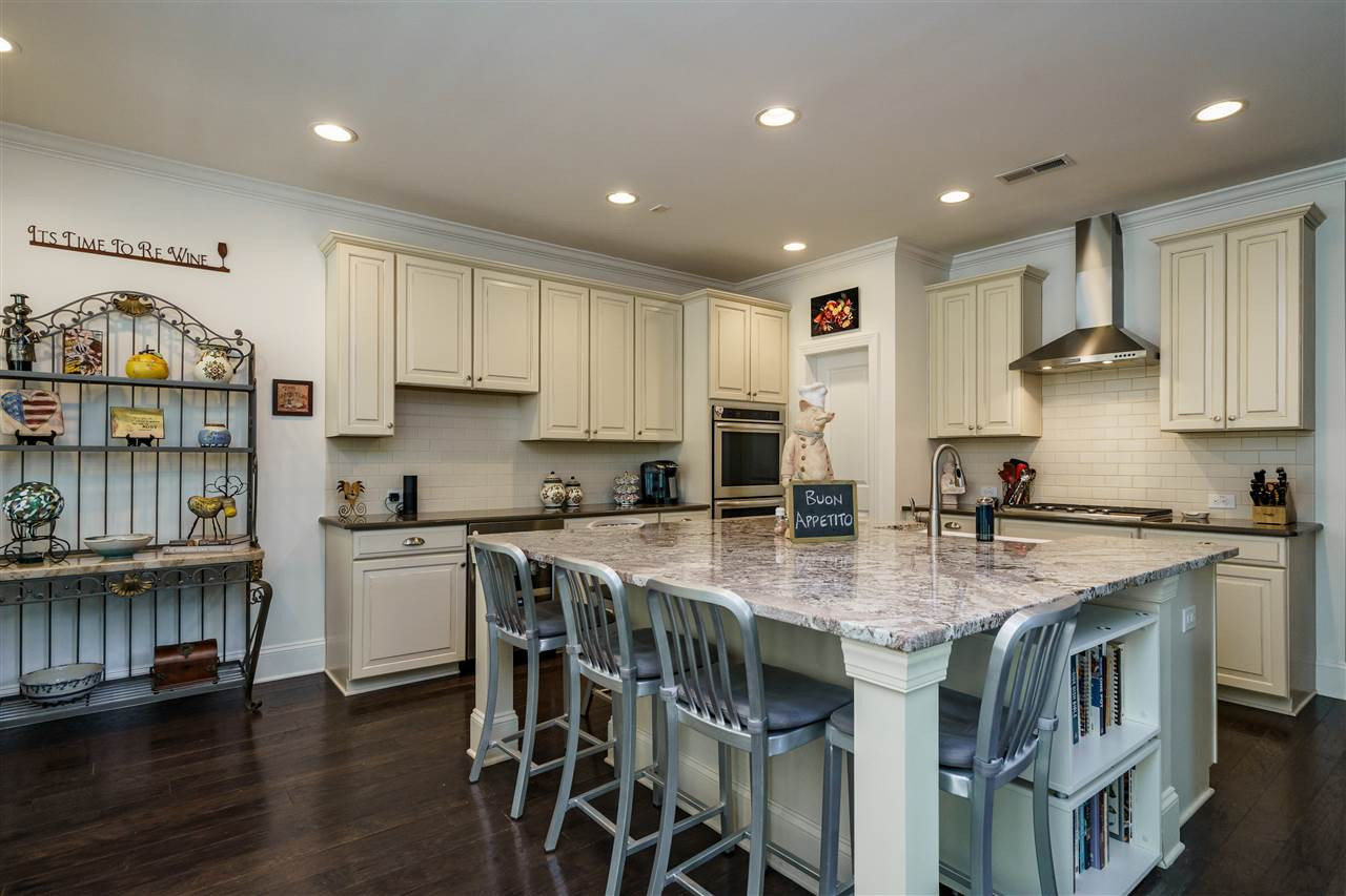 4005 Periwinkle Blue Lane Raleigh, NC 27612 - Photo 7 of 29 ...has upgraded appliances, a huge island, a farm sink, and a beverage 'fridge Chef's Kitchen
