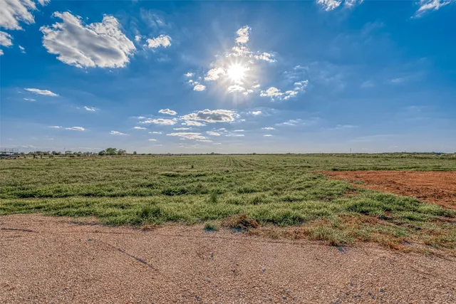 a view of a lake with a beach