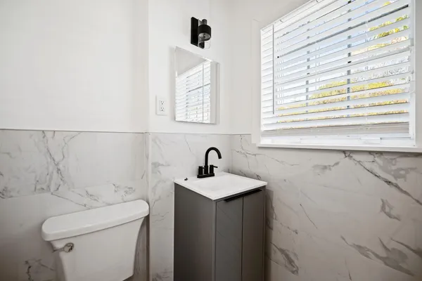 a bathroom with a sink and a toilet