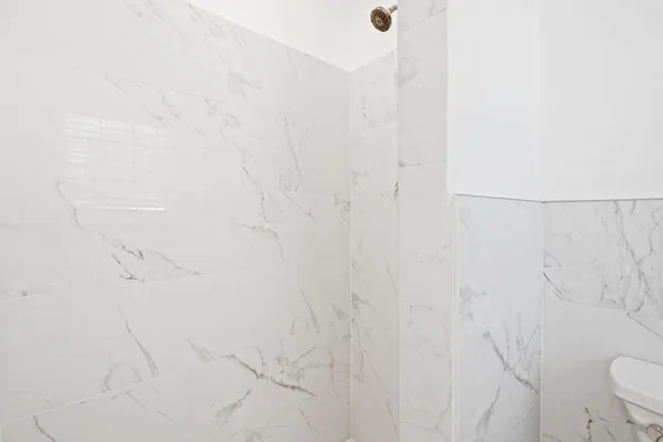 a bathroom with a shower curtain