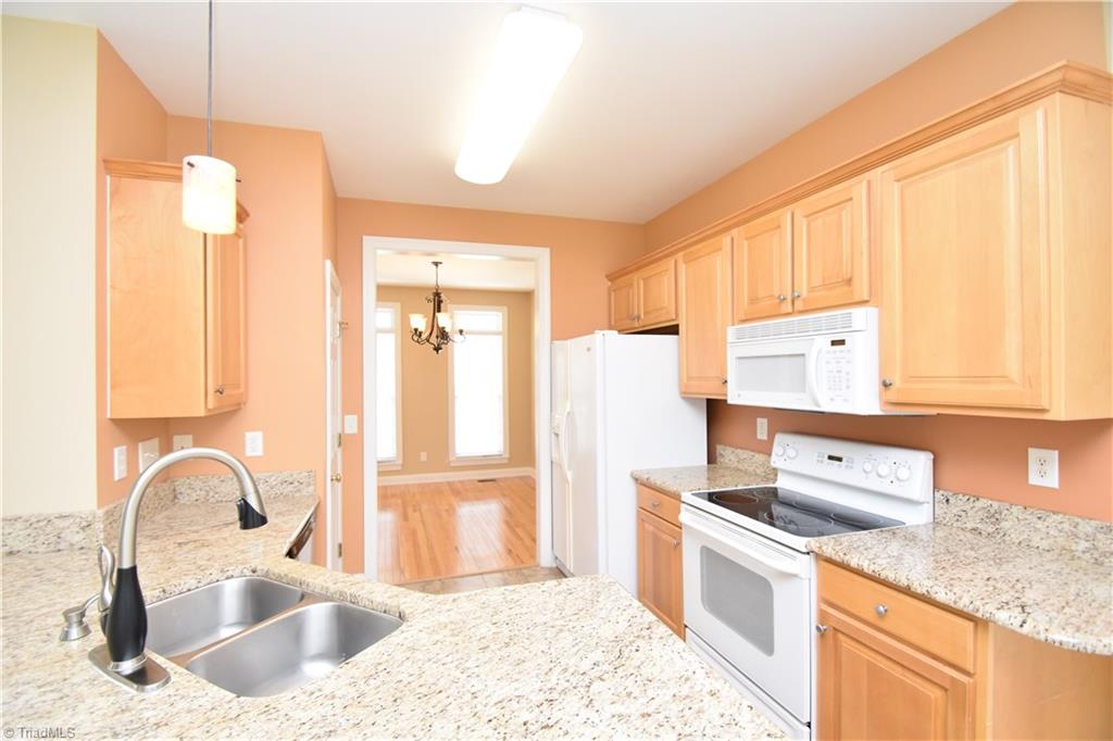 4006 Ballard Farm Road Colfax, NC 27235 - Photo 14 of 30 Kitchen offers granite tops