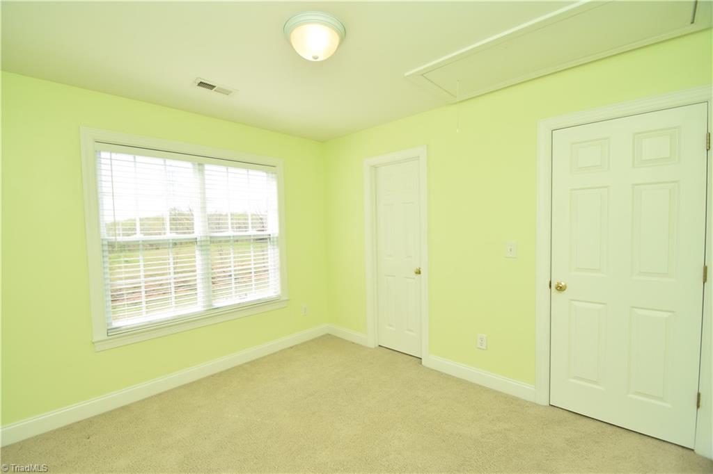 4006 Ballard Farm Road Colfax, NC 27235 - Photo 26 of 30 Second bedroom with nice walk-in closet