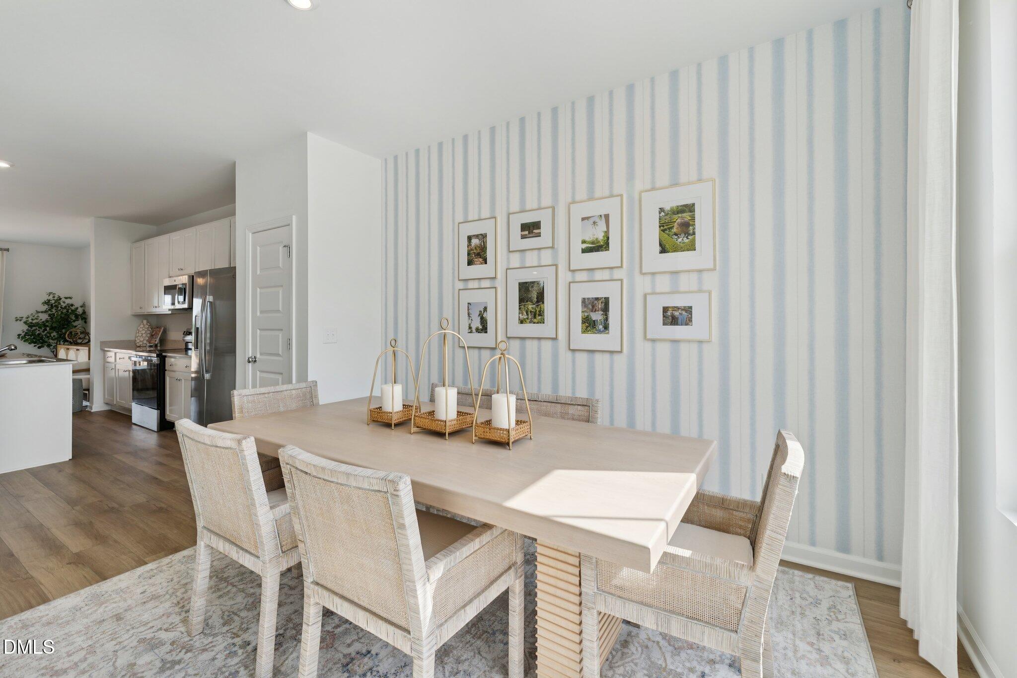 3202 Bomore Road Raleigh, NC 27610 - Photo 11 of 35 a dining room with furniture and window