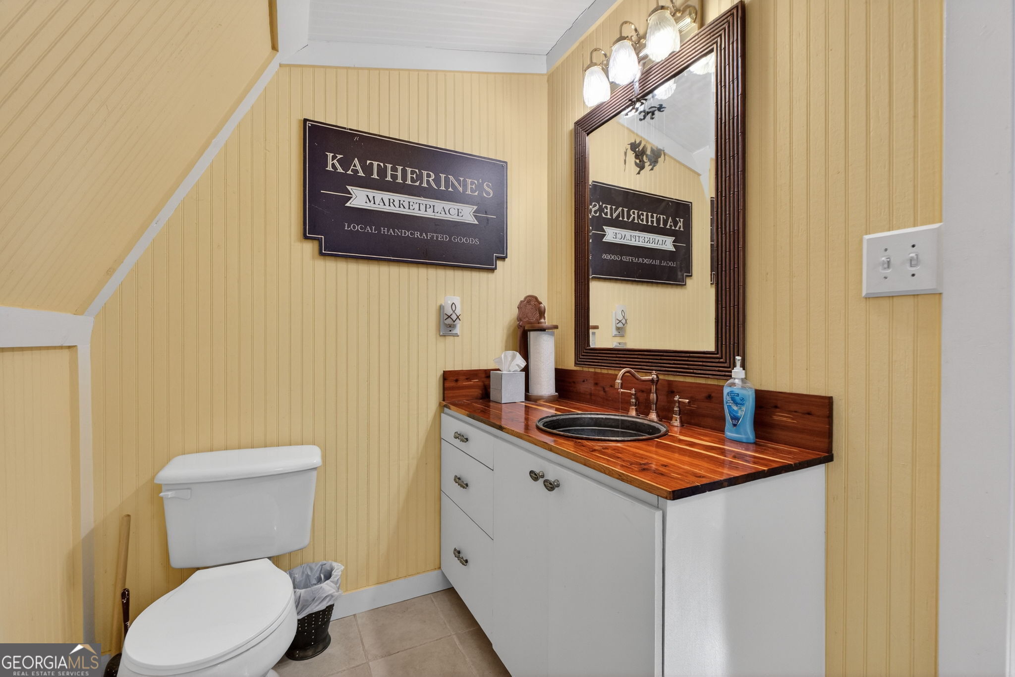 261 McIntosh Circle Jackson, GA 30233 - Photo 55 of 77 a bathroom with a toilet sink and mirror