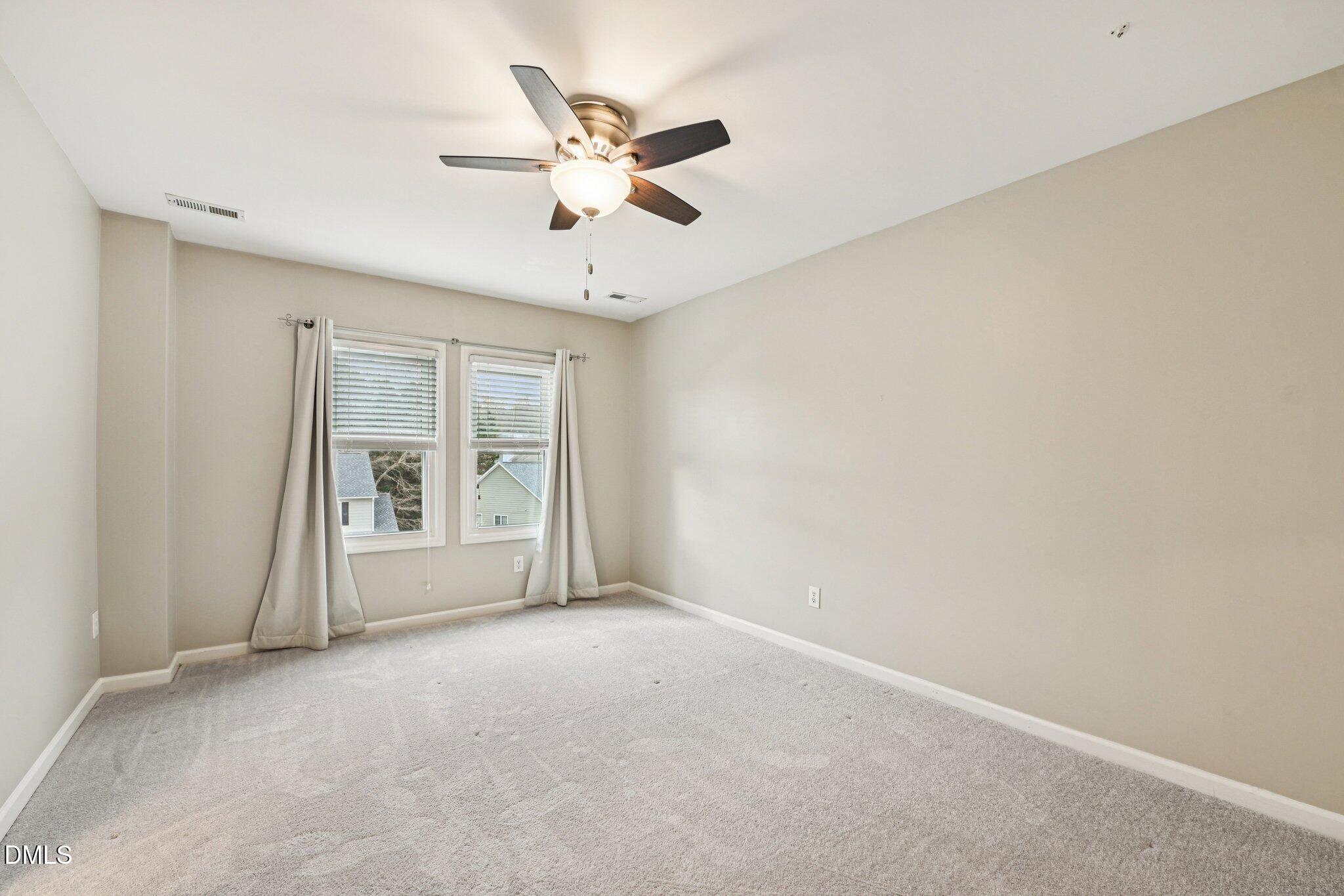 13100 Townfield Drive Raleigh, NC 27614 - Photo 17 of 31 a view of an empty room with a window