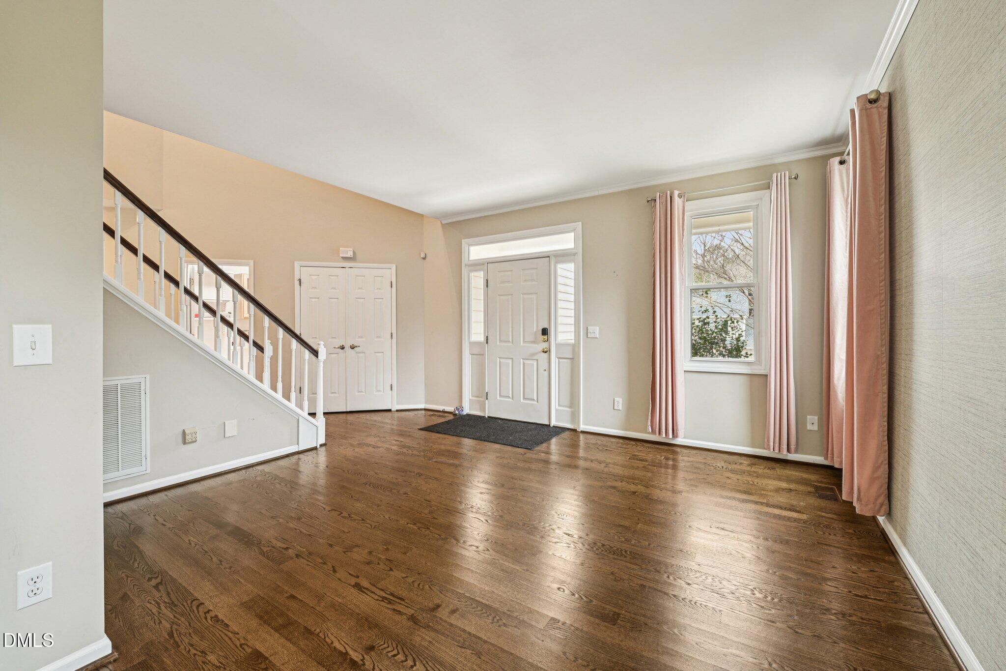 13100 Townfield Drive Raleigh, NC 27614 - Photo 2 of 31 a view of an entryway with wooden floor
