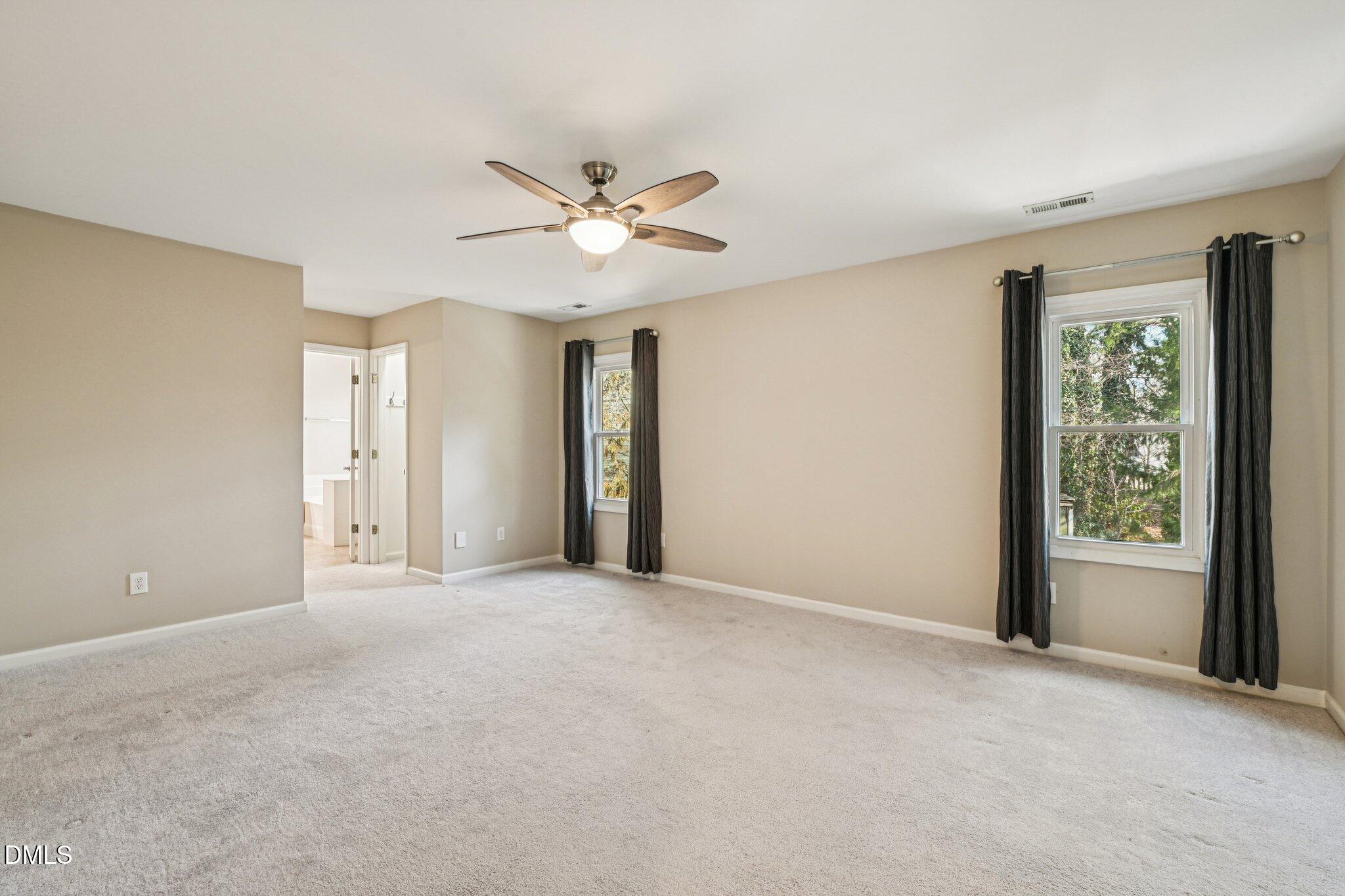 13100 Townfield Drive Raleigh, NC 27614 - Photo 22 of 31 a view of an empty room with a window