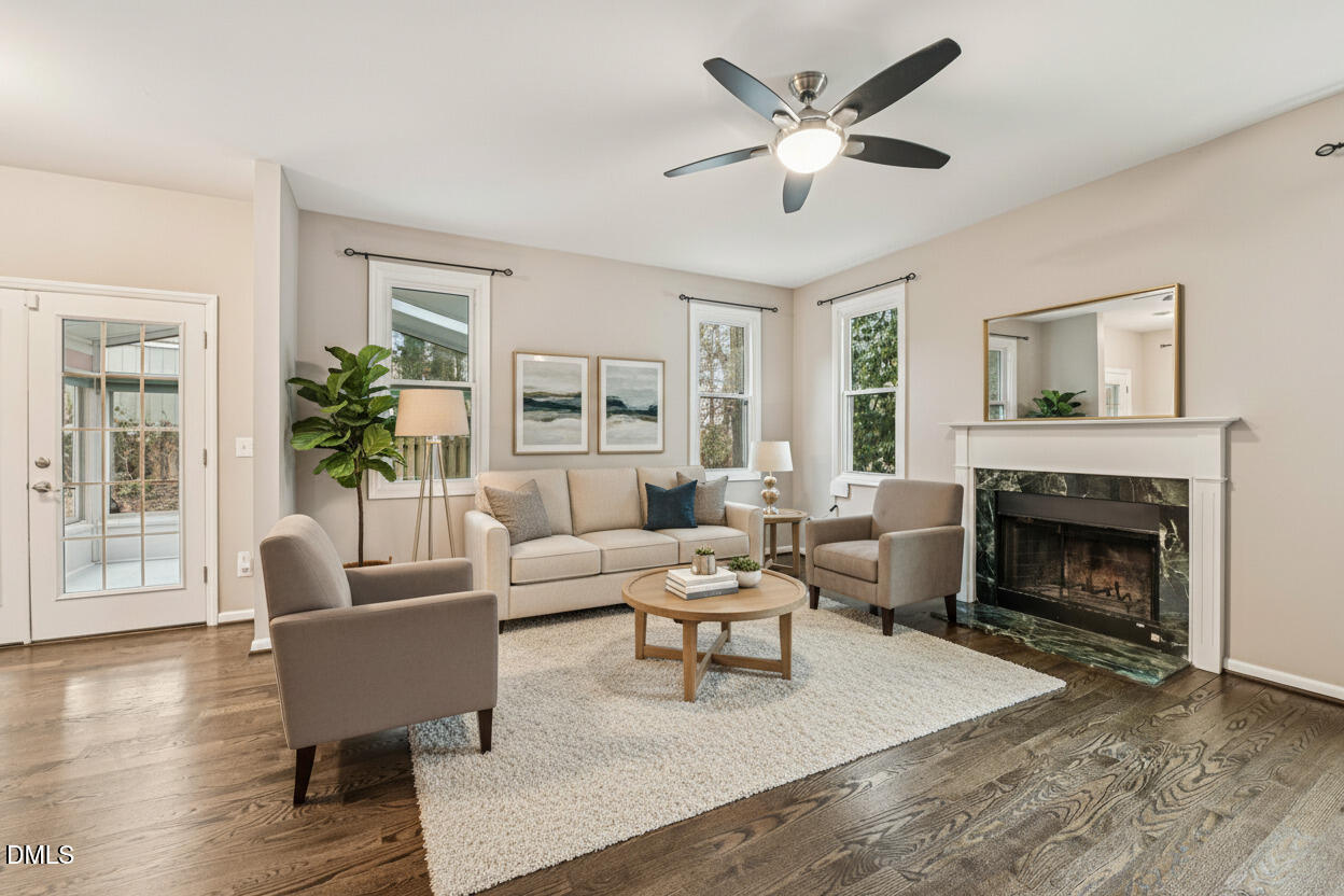 13100 Townfield Drive Raleigh, NC 27614 - Photo 6 of 31 a living room with furniture and a fireplace