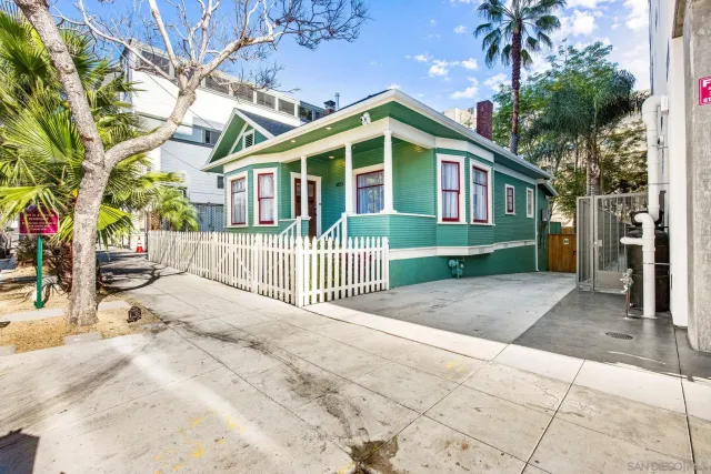 a front view of a house with a porch
