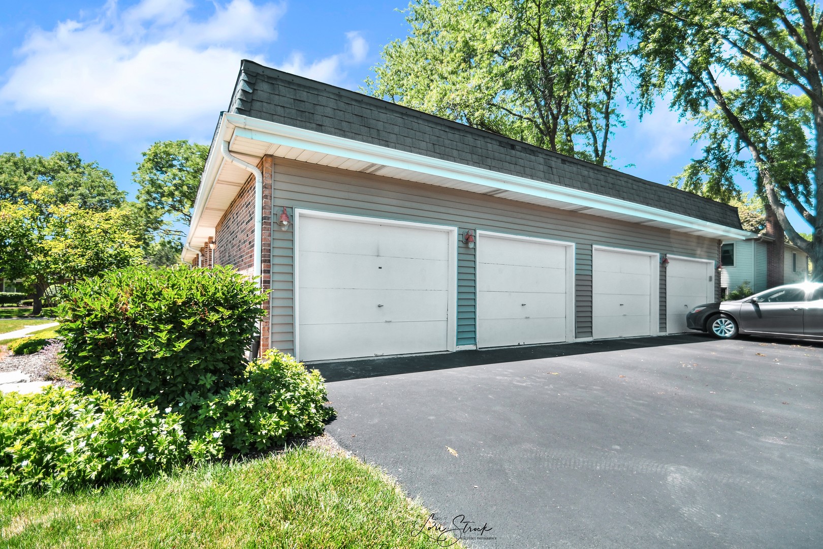 417 Sunnybrook Lane Wheaton, IL 60187 - Photo 3 of 17 a front view of a house with a garage