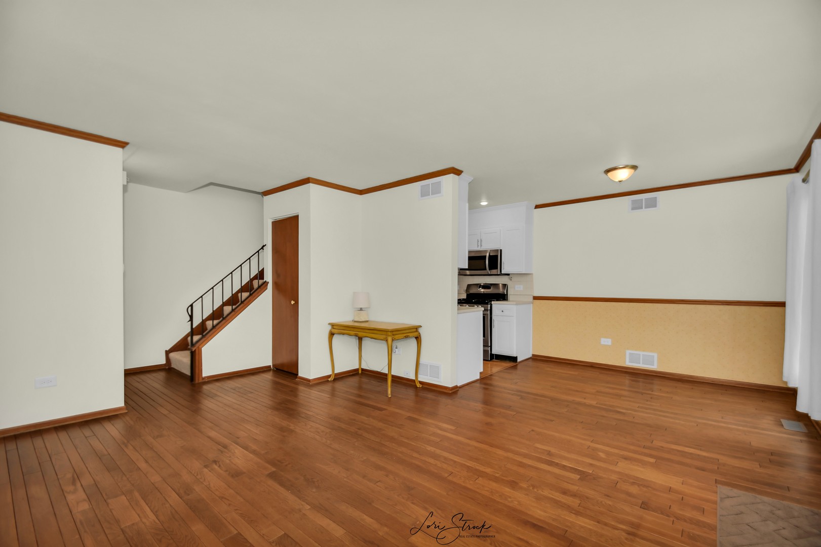 417 Sunnybrook Lane Wheaton, IL 60187 - Photo 4 of 17 a view of entryway with wooden floor and stairs