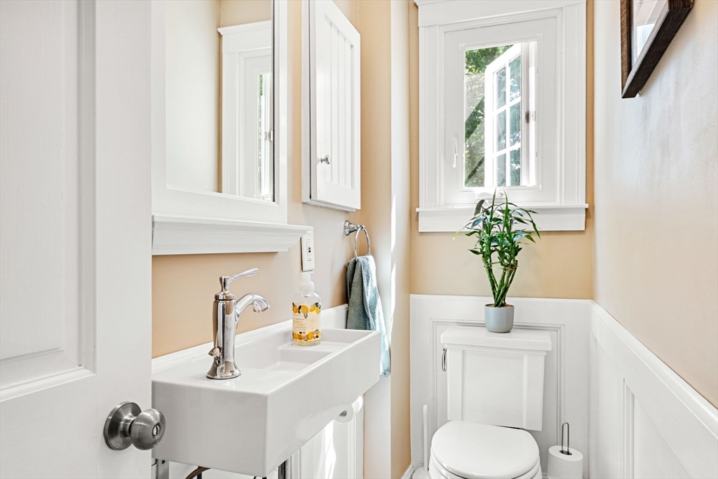 1 Valley Path Marshfield, MA 02050 - Photo 13 of 28 a bathroom with a toilet sink and mirror