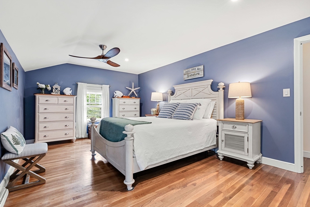 1 Valley Path Marshfield, MA 02050 - Photo 16 of 28 a bedroom with a bed and a chair