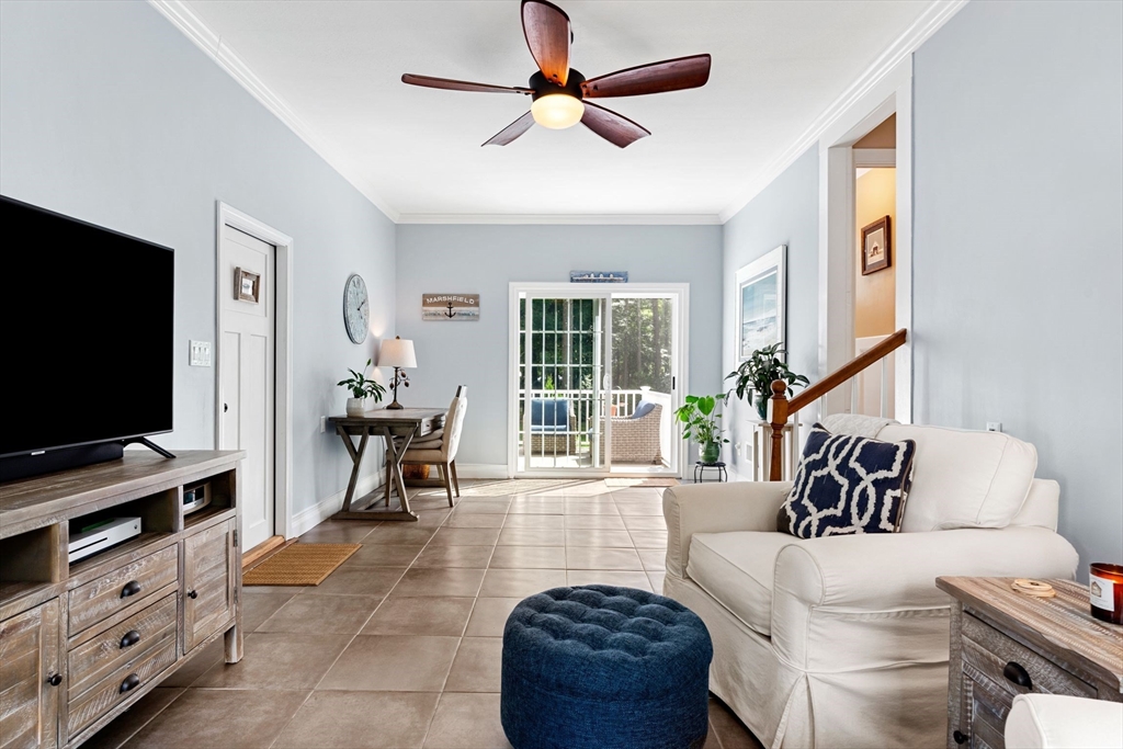 1 Valley Path Marshfield, MA 02050 - Photo 3 of 28 a living room with furniture and a flat screen tv