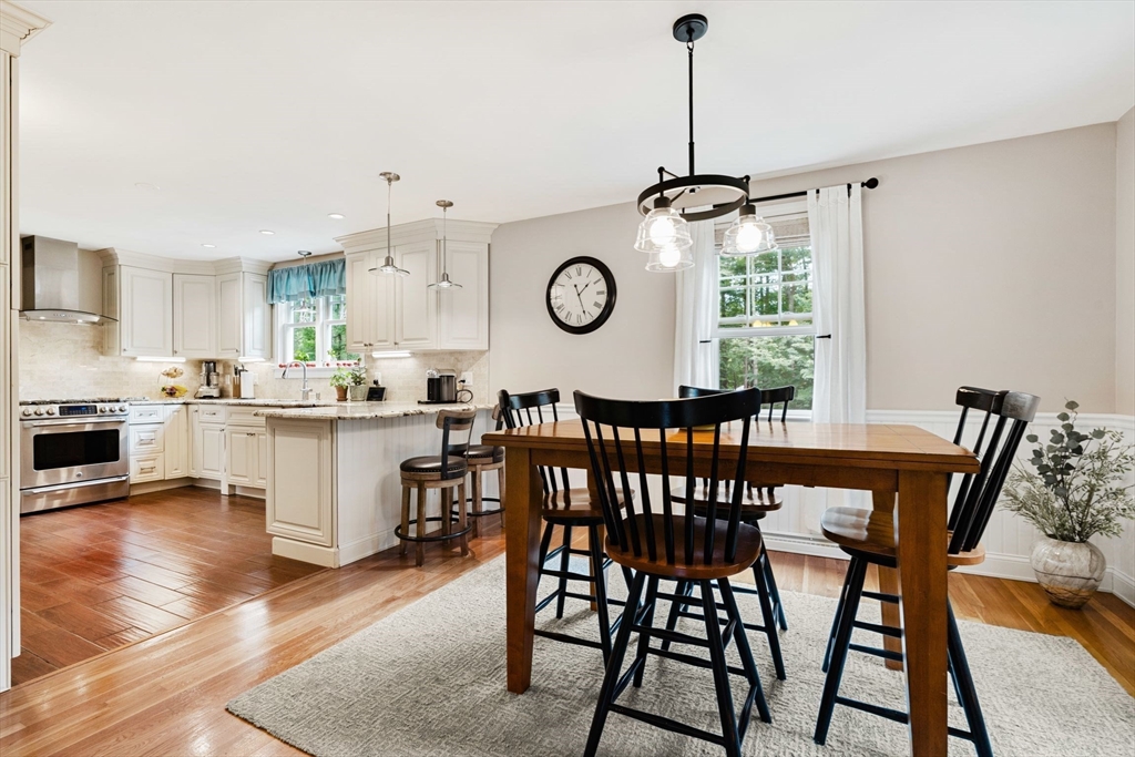 1 Valley Path Marshfield, MA 02050 - Photo 8 of 28 a view of kitchen with cabinets table and chairs