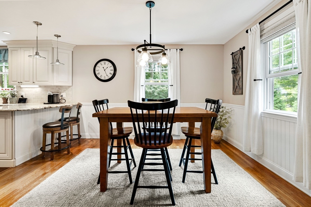 1 Valley Path Marshfield, MA 02050 - Photo 9 of 28 a dining room with furniture a rug and a large window