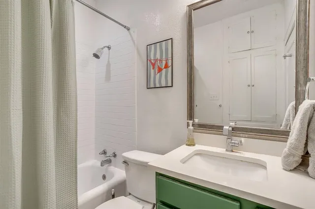 a bathroom with a sink and a bathtub
