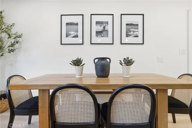 a kitchen with stainless steel appliances a sink stove and window