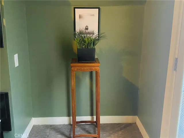 a view of wooden deck and a garden