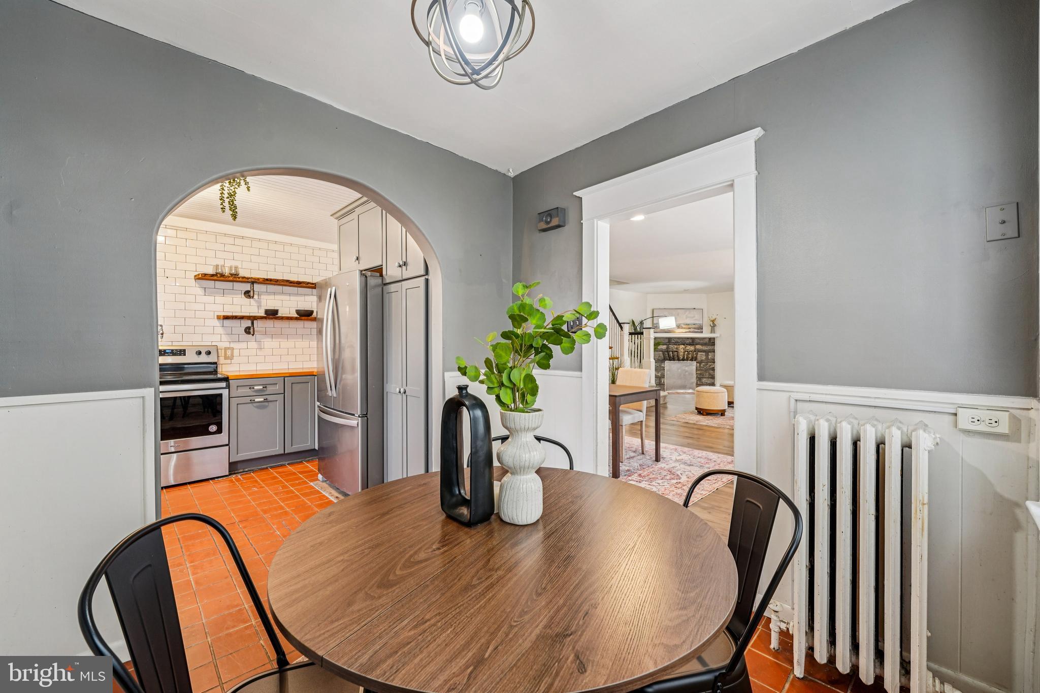 19 Wayne Avenue Springfield, PA 19064 - Photo 12 of 56 a view of a dining room with furniture window and wooden floor