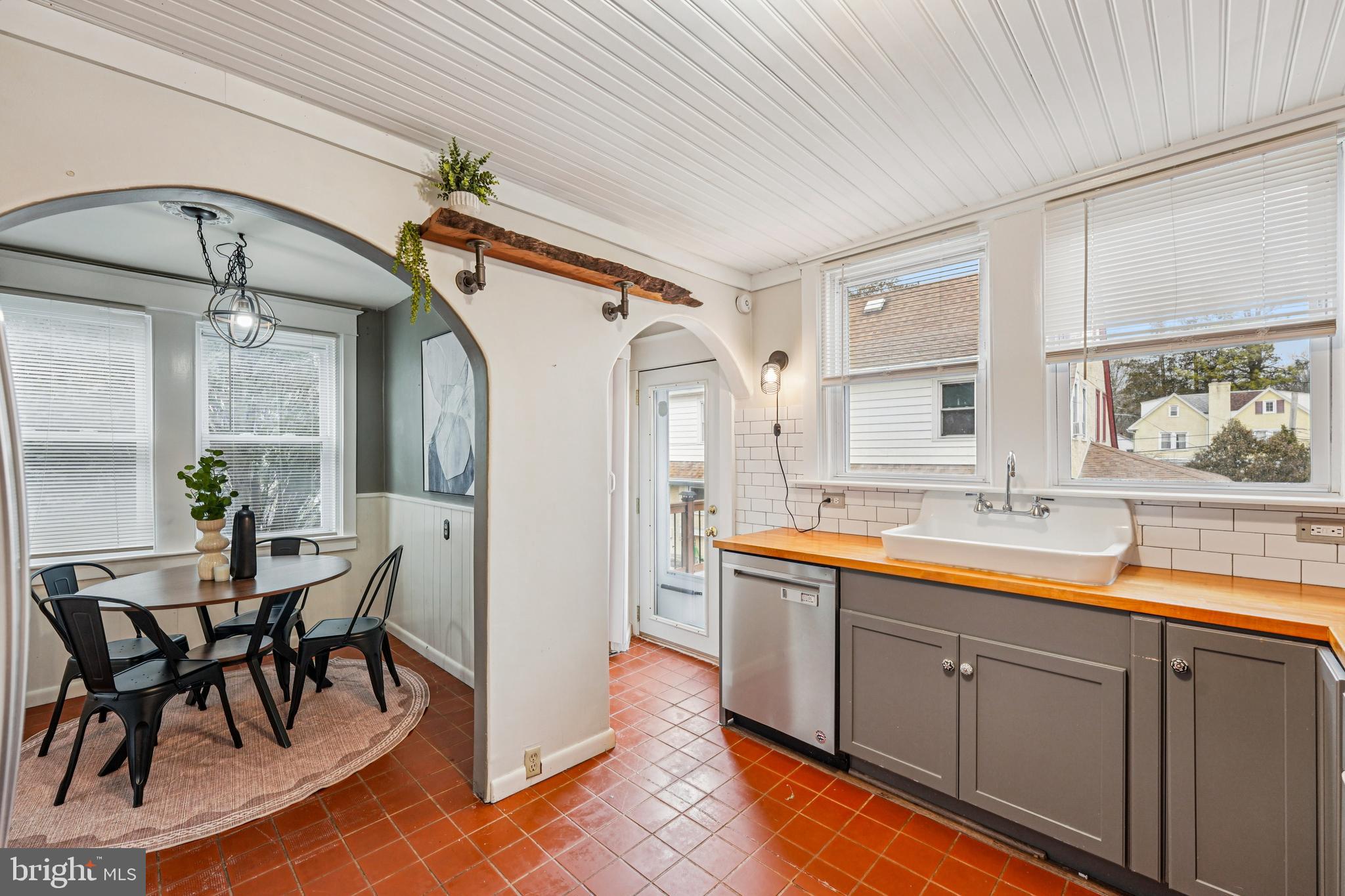 19 Wayne Avenue Springfield, PA 19064 - Photo 15 of 56 a kitchen with stainless steel appliances granite countertop sink and cabinets