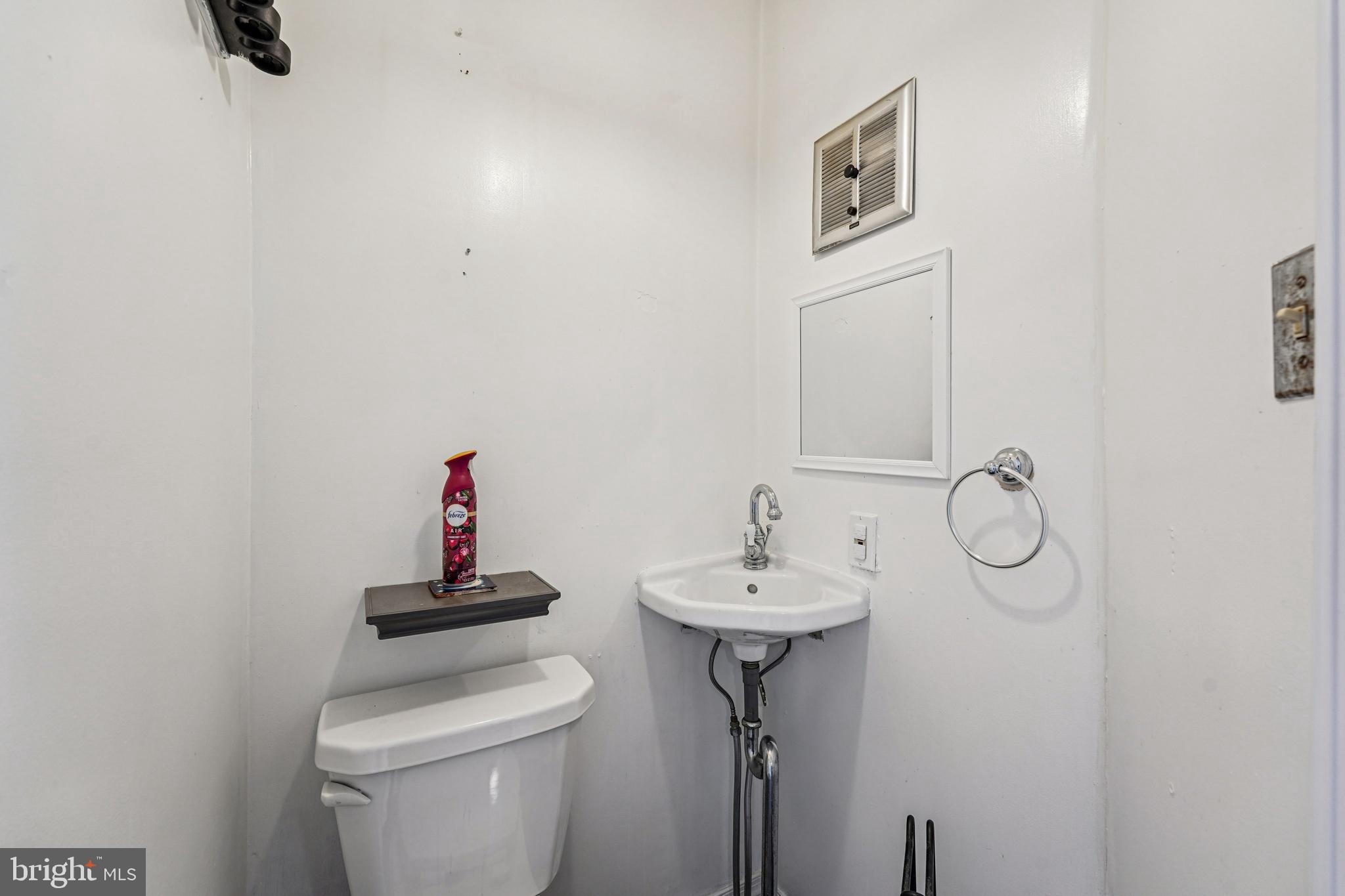 19 Wayne Avenue Springfield, PA 19064 - Photo 18 of 56 a bathroom with a toilet and a sink