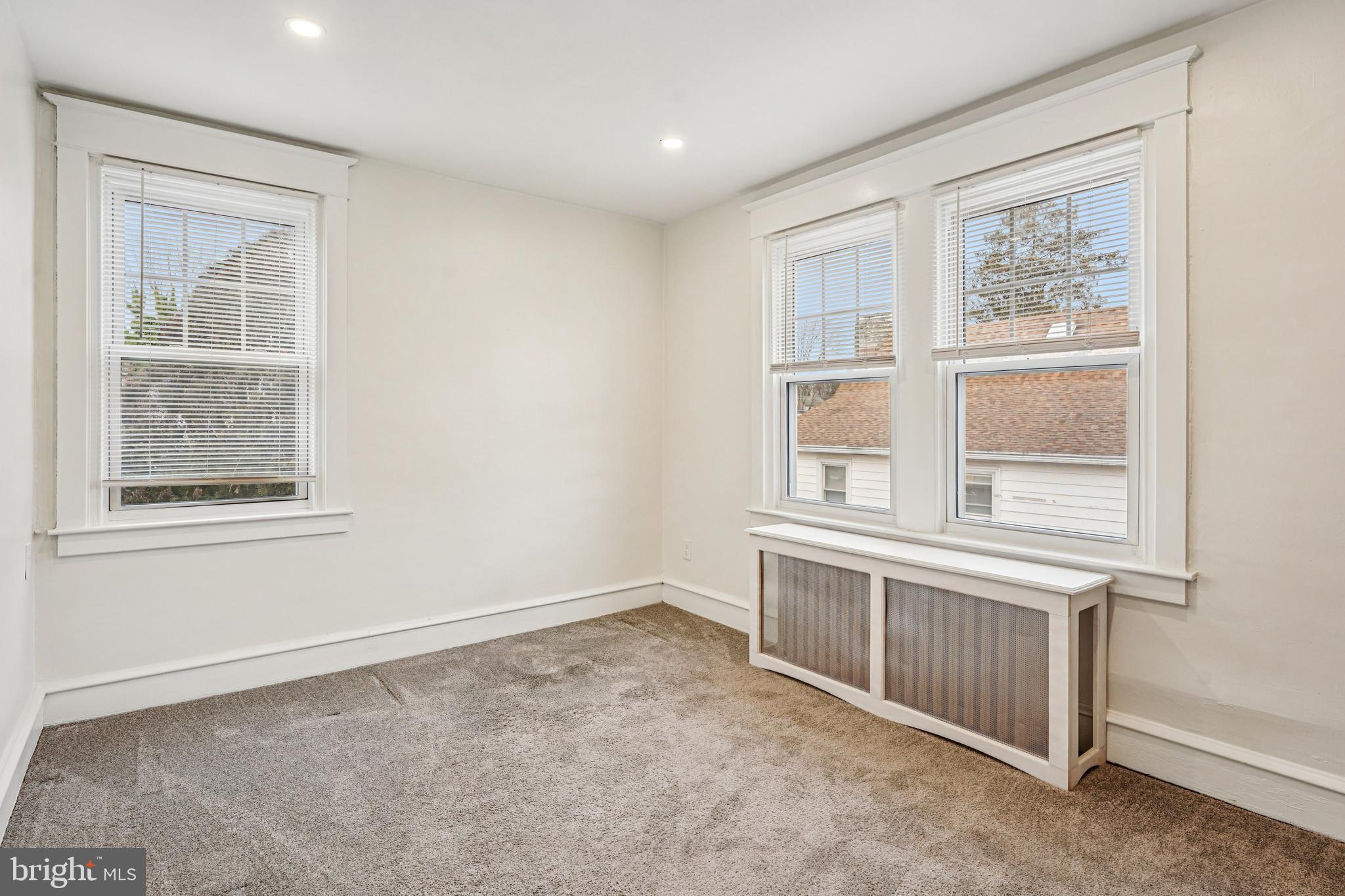 19 Wayne Avenue Springfield, PA 19064 - Photo 19 of 56 an empty room with a window