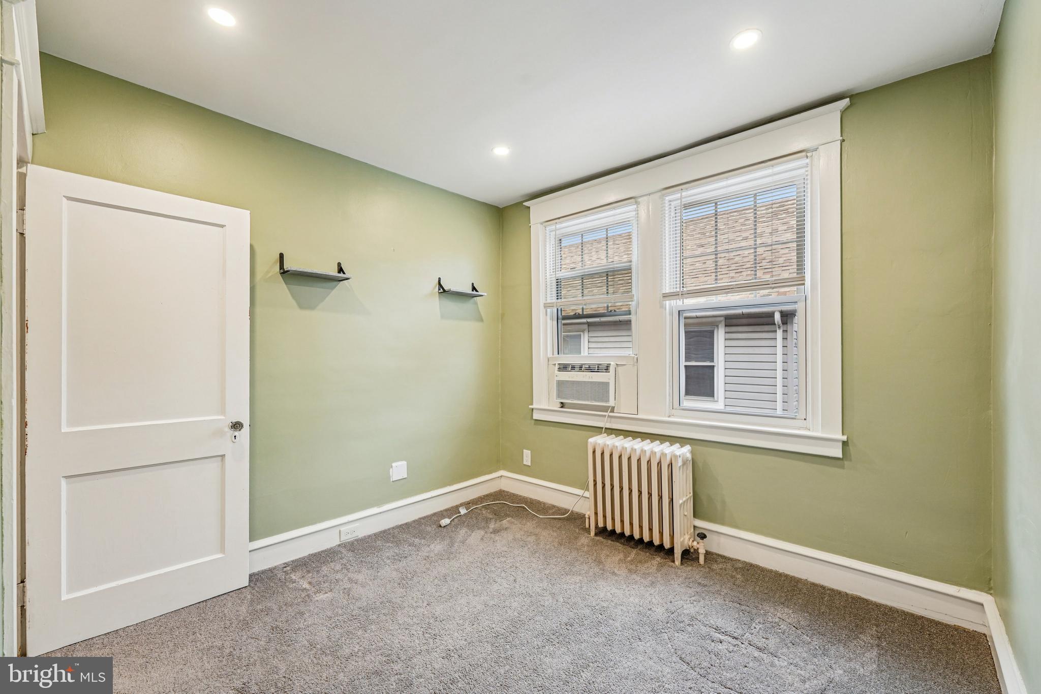 19 Wayne Avenue Springfield, PA 19064 - Photo 21 of 56 an empty room with a window