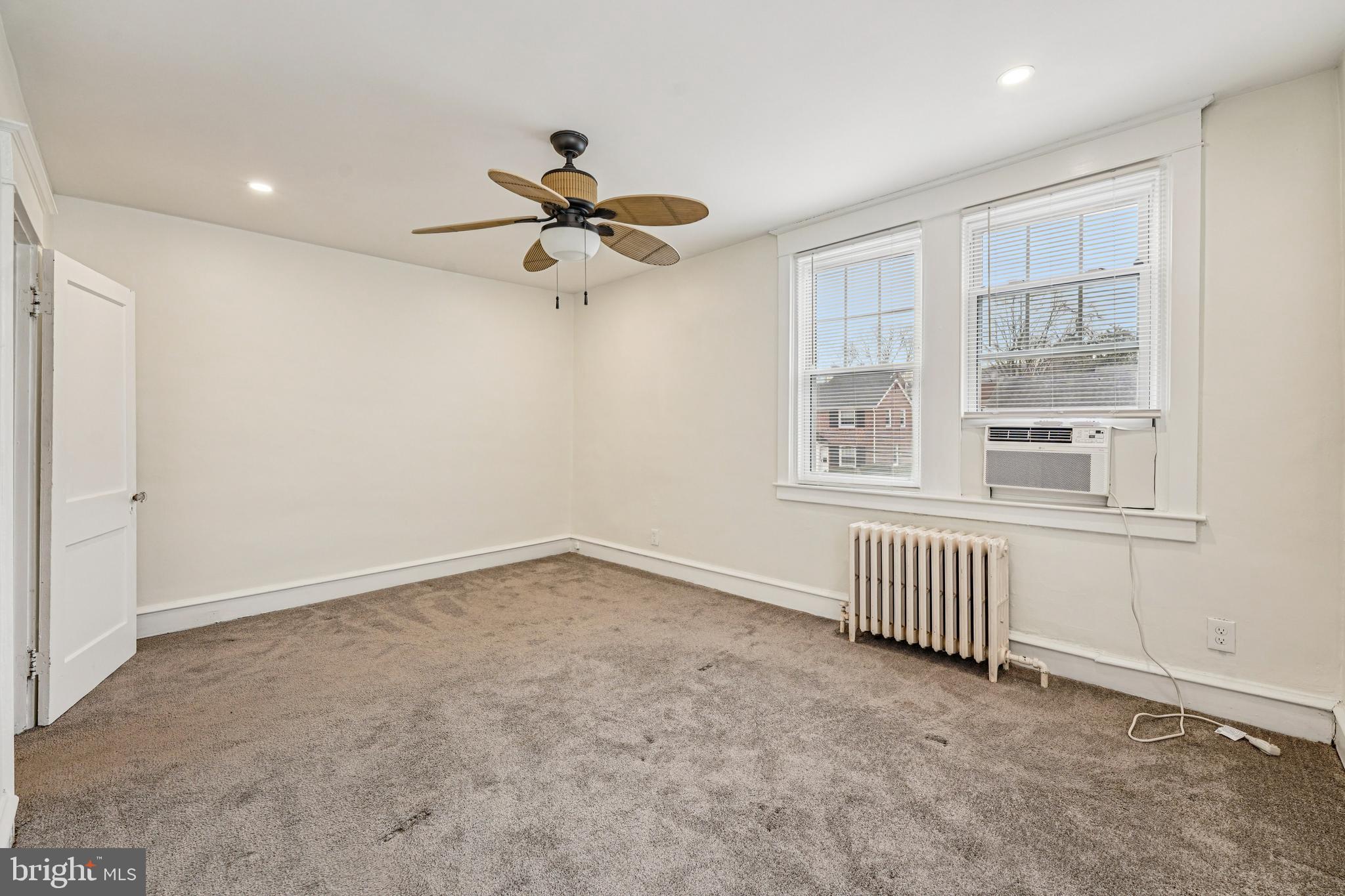 19 Wayne Avenue Springfield, PA 19064 - Photo 27 of 56 a view of an empty room with a window