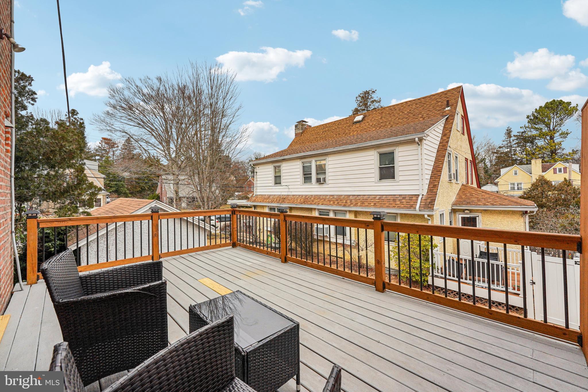 19 Wayne Avenue Springfield, PA 19064 - Photo 42 of 56 a view of a roof deck with wooden floor and fence