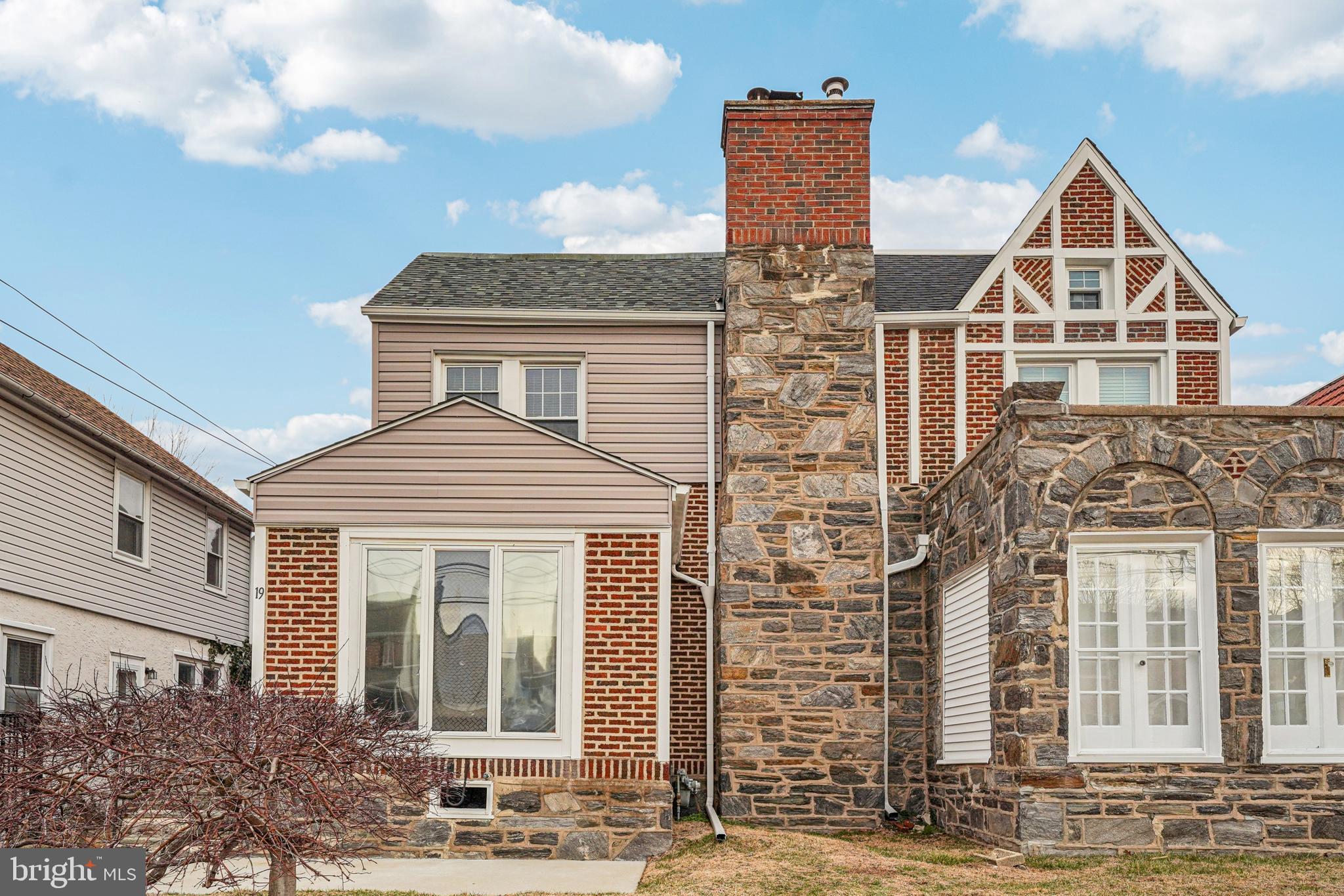 19 Wayne Avenue Springfield, PA 19064 - Photo 50 of 56 front view of a house with a street