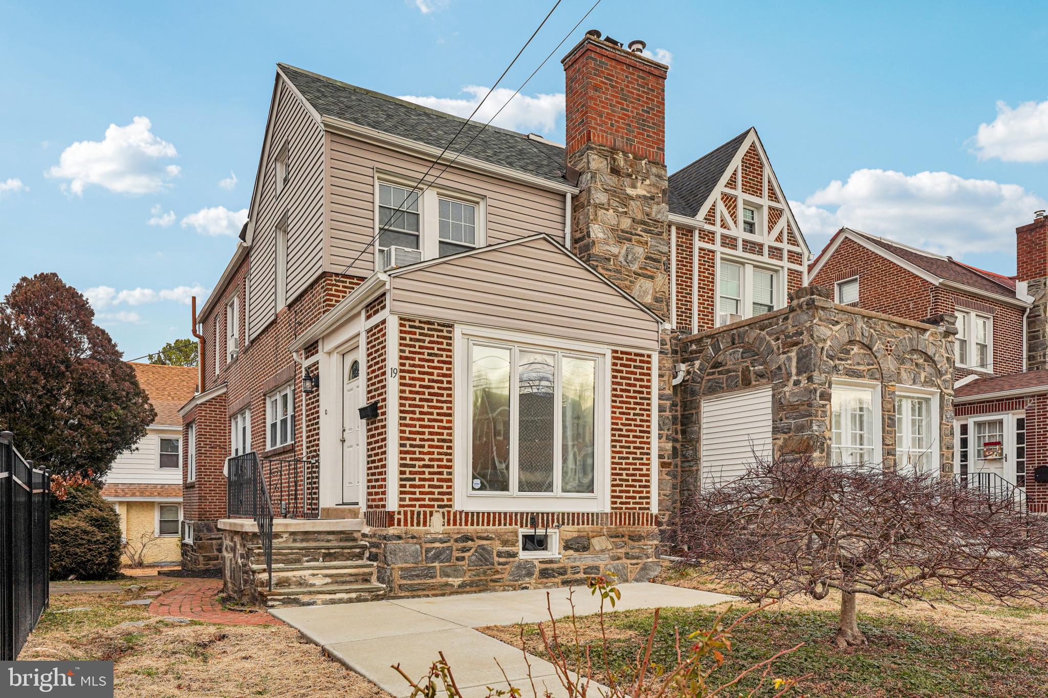 19 Wayne Avenue Springfield, PA 19064 - Photo 52 of 56 a front view of a house with a yard