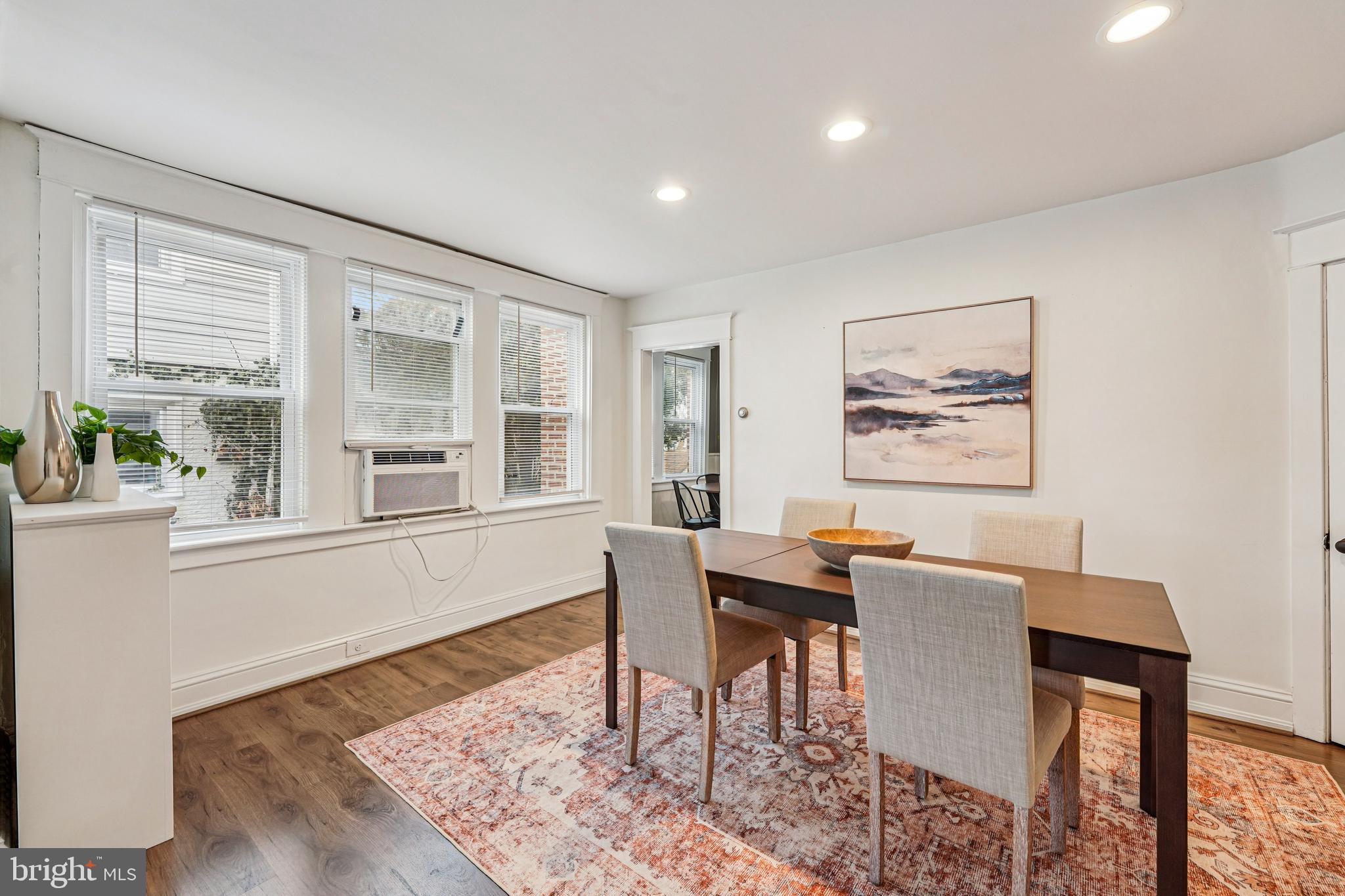 19 Wayne Avenue Springfield, PA 19064 - Photo 8 of 56 a dining room with wooden floor and a window