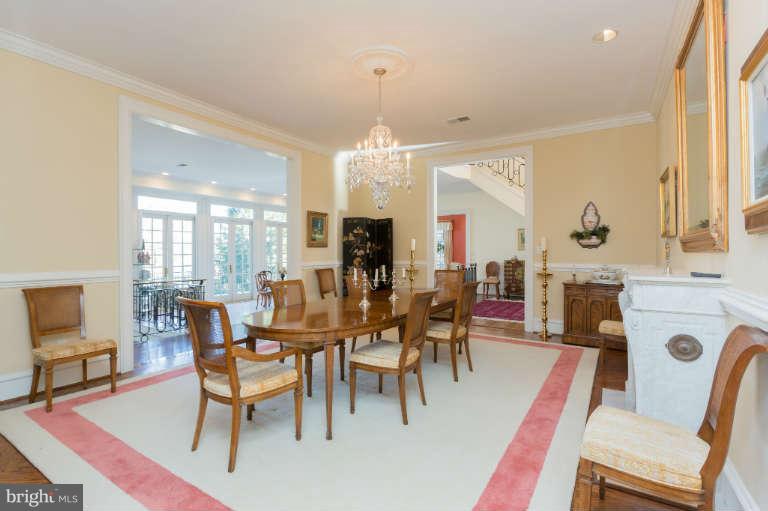 626 Chain Bridge Road McLean, VA 22101 - Photo 12 of 30 a view of a dining room with furniture window and wooden floor
