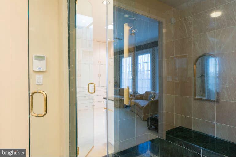 626 Chain Bridge Road McLean, VA 22101 - Photo 18 of 30 a bathroom with a shower