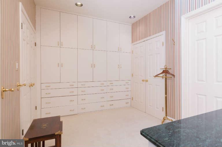 626 Chain Bridge Road McLean, VA 22101 - Photo 19 of 30 wooden floor and cabinet in a room