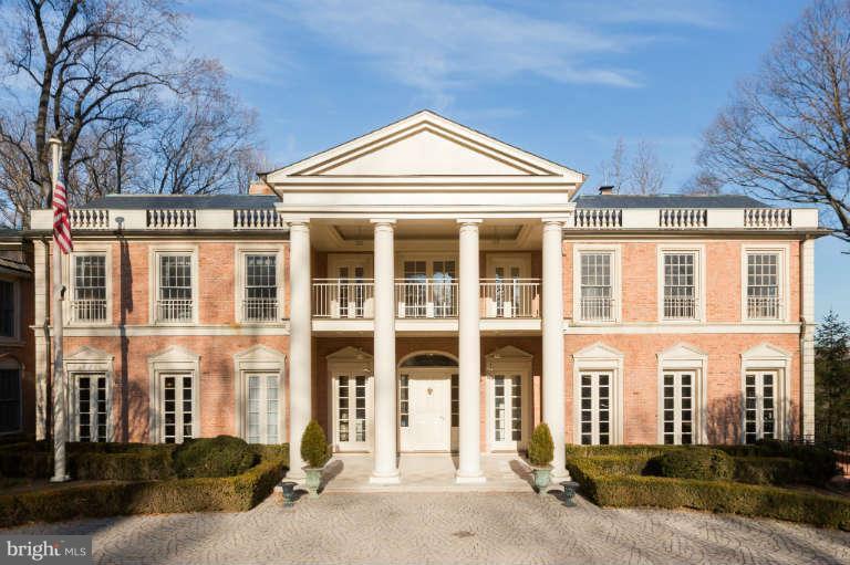 626 Chain Bridge Road McLean, VA 22101 - Photo 3 of 30 front view of a brick house with a small yard