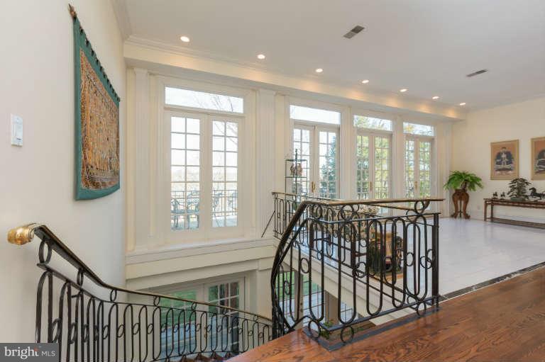 626 Chain Bridge Road McLean, VA 22101 - Photo 24 of 30 a view of bedroom with furniture and floor to ceiling window