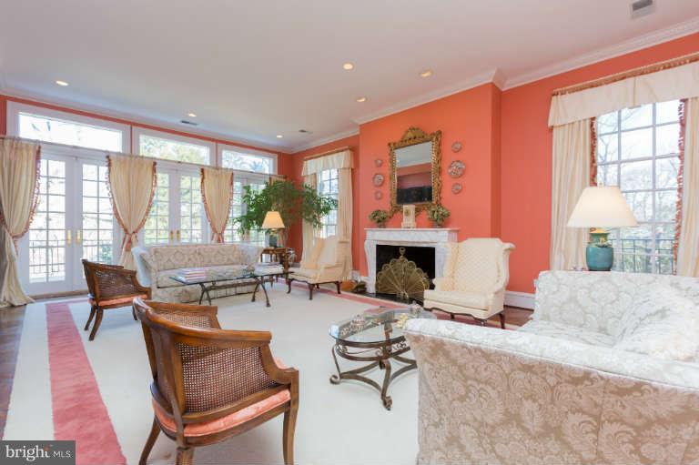 626 Chain Bridge Road McLean, VA 22101 - Photo 8 of 30 a living room with fireplace furniture and a large window