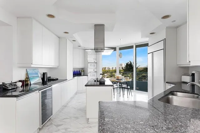 a bedroom with a bed and a table