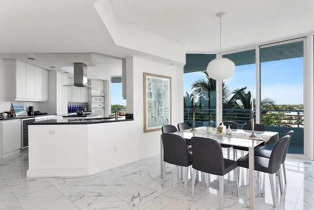 a bedroom with a bed and a book shelf